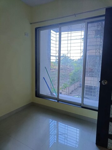 Bedroom in 1 BHK Apartment at SK Heights, Ghansoli – for Rent