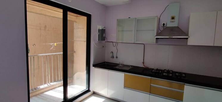 Kitchen, pride-world-city-brooklyn 3 Bedroom 1424 Sq.Ft. Apartment In Charholi Budruk Pune 9314314