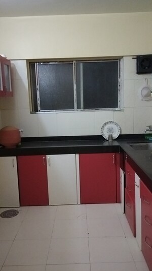 Kitchen in 1 BHK Apartment at Sai Dham CHS, Dhanori – for Rent