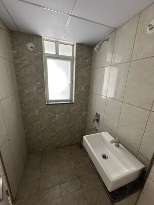 Bathroom in 3 BHK Apartment at Godrej Green Vistas, Mahalunge – for Rent