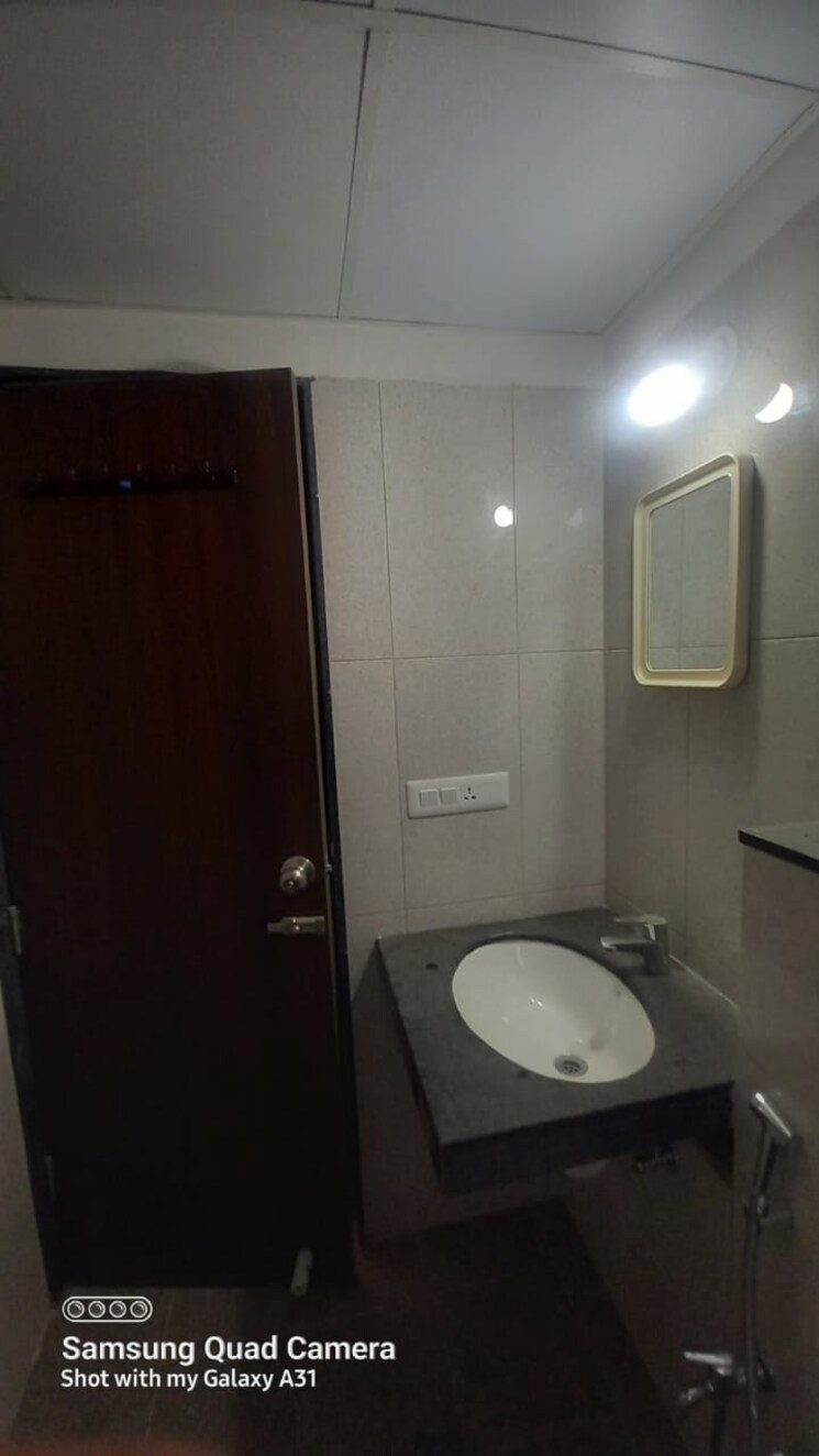 Bathroom, gera-world-of-joy 2 Bedroom 645 Sq.Ft. Apartment In Kharadi Pune 9314736