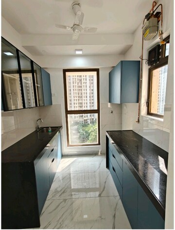 Kitchen in 1 BHK Apartment at Raymond Ten X Habitat, Pokhran Road No Two – for Rent