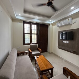 Living Room in 2 BHK Apartment at Palm Residency Chhatarpur, Rajpur Khurd Extension – for Rent