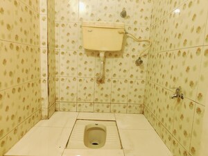Bathroom in 1 BHK Apartment at Seawoods – for Sale