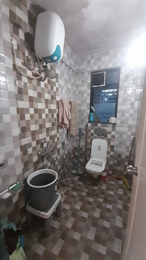 Kitchen in 2 BHK Apartment at Darode Jog Crossover County, Sinhagad Road – for Sale