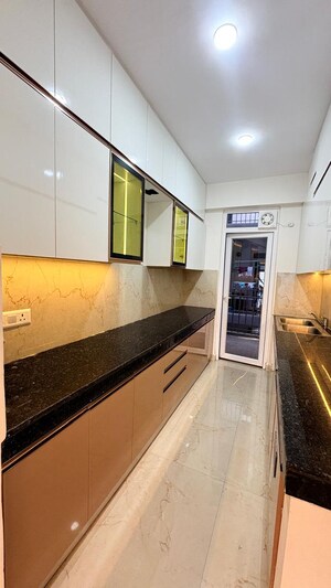 Kitchen in 4 BHK Builder Floor at Ansal API Versalia, Sector 67a – for Sale