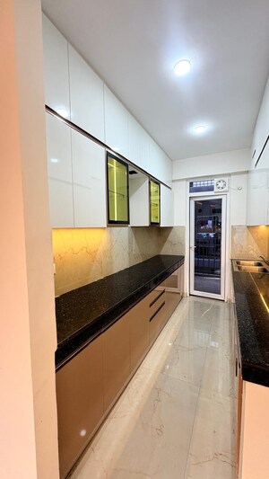 Kitchen in 4 BHK Builder Floor at Ansal API Versalia, Sector 67a – for Sale