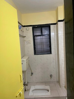 Bathroom in 2 BHK Apartment at Aatithya Avenue, Pimple Saudagar – for Rent