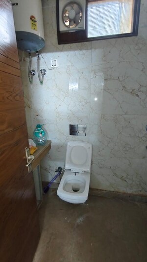 Bathroom in 2 BHK Builder Floor at Kalkaji – for Rent