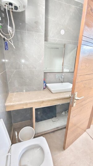 Bathroom in 2 BHK Builder Floor at Kalkaji – for Rent
