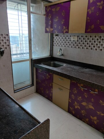 Kitchen in 1 BHK Apartment at Ajmera New Era, Kalyan West – for Rent