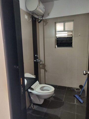 Bathroom in 3 BHK Apartment at Kolte Patil Beryl, Kharadi – for Rent