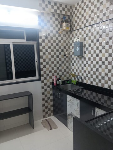 Kitchen in 1 BHK Apartment at Aakar Goregaon Rasik CHS, Goregaon West – for Sale