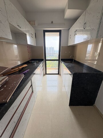 Kitchen in 2 BHK Apartment at Lodha Palava City Lakeshore Greens, Dombivli East – for Rent
