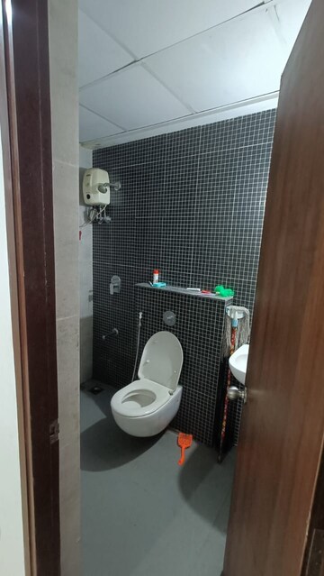 Bathroom in 1.5 BHK Apartment at Lodha Palava City Lakeshore Greens, Dombivli East – for Rent
