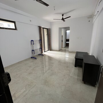 Living Room in 1 BHK Apartment at Lodha Palava Downtown Dombivli East, Taloja Bypass Road – for Rent