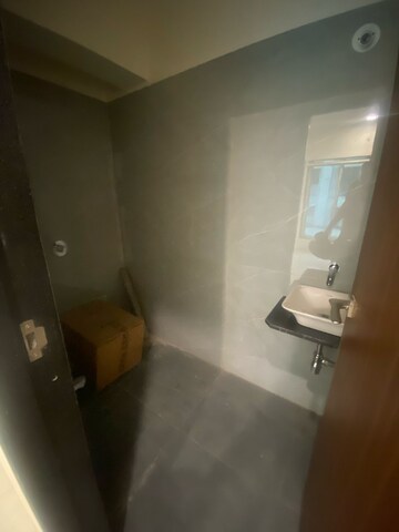 Bathroom in 1 BHK Apartment at Hirani Om Sukhkarta Heights, Vikhroli East – for Rent