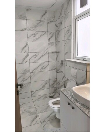 Bathroom in 3 BHK Apartment at Mahindra Luminare, Sector 59 – for Sale