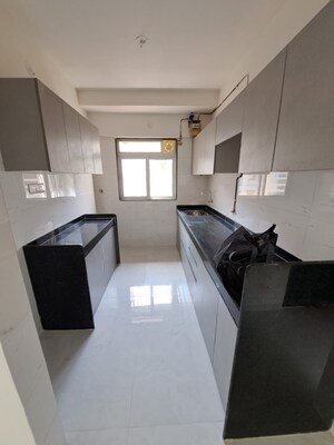 Kitchen in 2 BHK Apartment at Suvasya Swastik Onyx, Tagore Nagar – for Rent