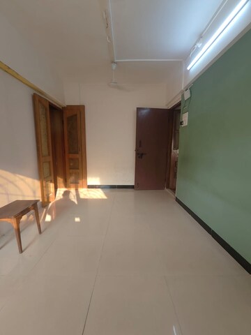 Living Room in 1 BHK Apartment at Rishikesh CHS, Malad West – for Rent