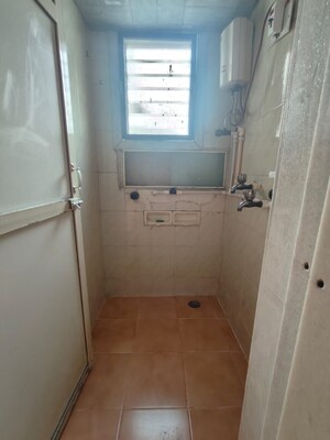 Bathroom in 1 BHK Apartment at Rishikesh CHS, Malad West – for Rent
