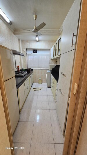 Kitchen in 2 BHK Apartment at Subhangan CHS, Malad West – for Rent
