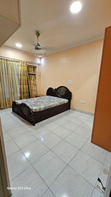 Bedroom in 2 BHK Apartment at Subhangan CHS, Malad West – for Rent