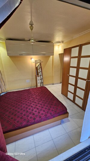Bedroom in 2 BHK Apartment at Subhangan CHS, Malad West – for Rent