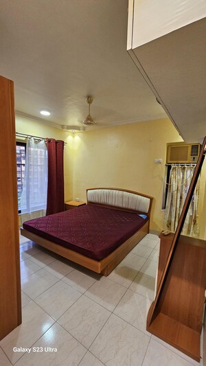 Bedroom in 2 BHK Apartment at Subhangan CHS, Malad West – for Rent