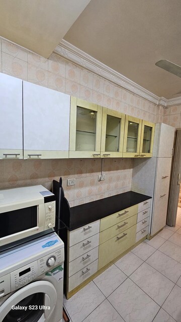 Kitchen in 2 BHK Apartment at Subhangan CHS, Malad West – for Rent