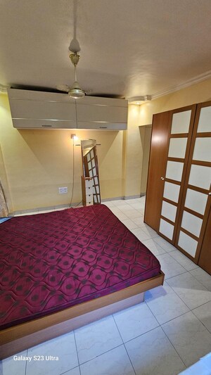 Bedroom in 2 BHK Apartment at Subhangan CHS, Malad West – for Rent