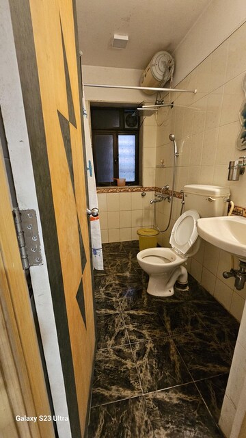 Bathroom in 2 BHK Apartment at Subhangan CHS, Malad West – for Rent