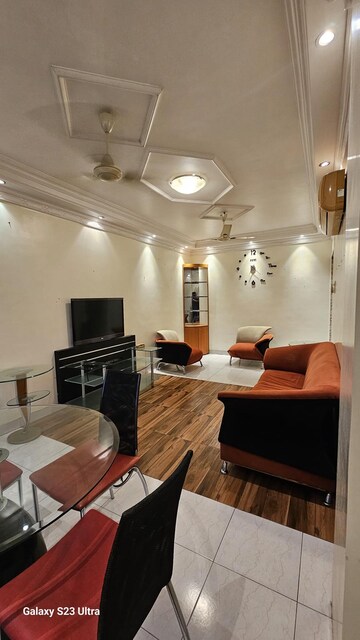Living Room in 2 BHK Apartment at Subhangan CHS, Malad West – for Rent