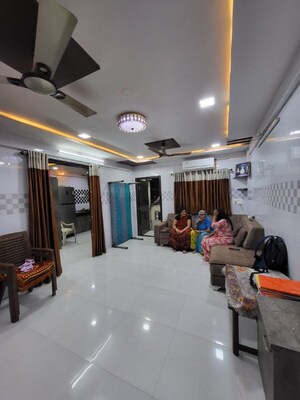 Living Room in 2 BHK Apartment at Varachha – for Sale