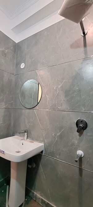 Bathroom in 1.5 BHK Builder Floor at Chattarpur – for Rent