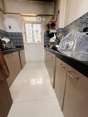 Kitchen in 1 BHK Apartment at Lodha Amara, Kolshet Road – for Sale