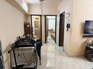 Living Room in 1 BHK Apartment at Lodha Amara, Kolshet Road – for Sale