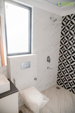 Bathroom in 4 BHK Builder Floor at Ansal API Esencia, Sector 67 – for Sale