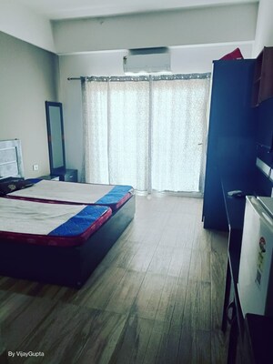 Bedroom in 1 BHK Apartment at Paramount Golfforeste, Zeta I Greater Noida – for Rent