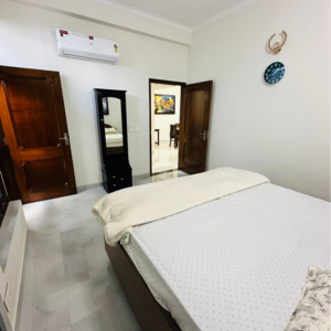 Bedroom in 2.5 BHK Builder Floor at RWA Apartments Sector 37, Arun Vihar – for Rent