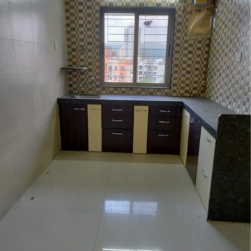 Kitchen in 1 BHK Apartment at Ajanta Ellora, Tawde Wadi – for Sale
