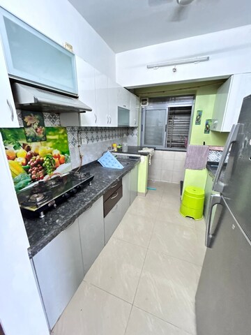 Kitchen in 2 BHK Apartment at Amanora Future Towers, Hadapsar – for Rent