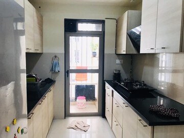 Kitchen in 2 BHK Apartment at Quality Annex, Shilphata – for Sale