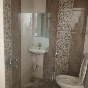 Bathroom in 3 BHK Apartment at Ratnam Gardenbay, Vemali – for Rent