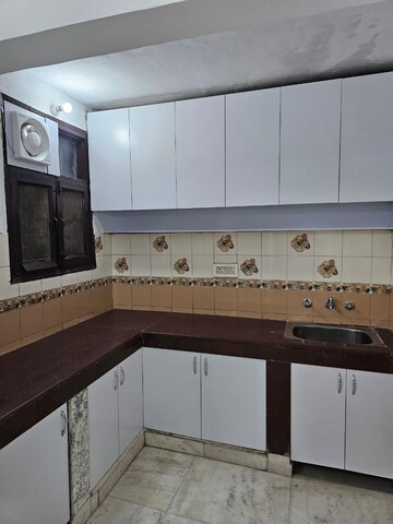Kitchen in 3 BHK Builder Floor at Malviya Nagar – for Sale