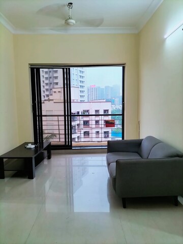 Living Room in 1 BHK Apartment at K Raheja Raheja Residency, Malad East – for Rent