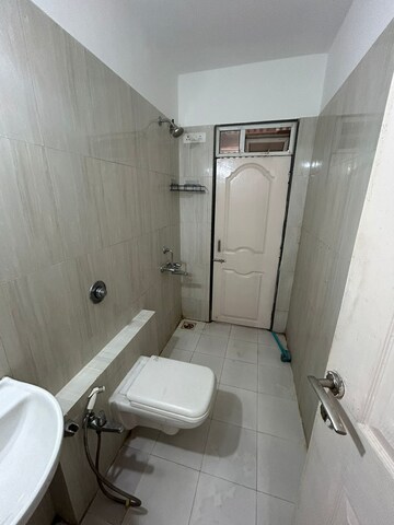 Bathroom in 2 BHK Apartment at Hiranandani The Walk, Ghodbunder Road – for Rent