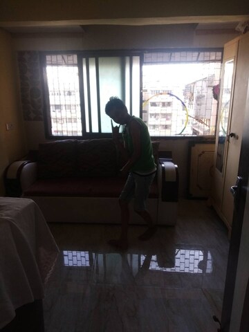 Living Room in 2 BHK Apartment at Damodar Park Apartment, Ghatkopar West – for Sale