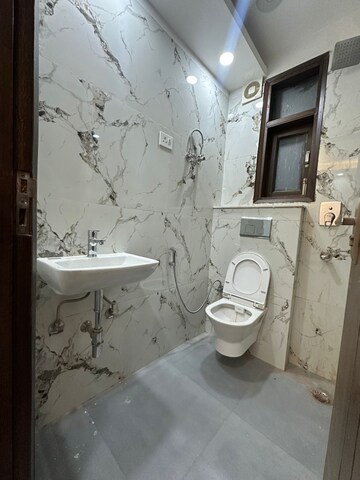 Bathroom in 2 BHK Builder Floor at Freedom Fighters Enclave – for Rent
