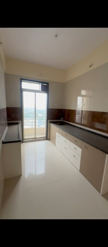 Kitchen in 1 BHK Apartment at Regency Estate, Dombivli East – for Rent